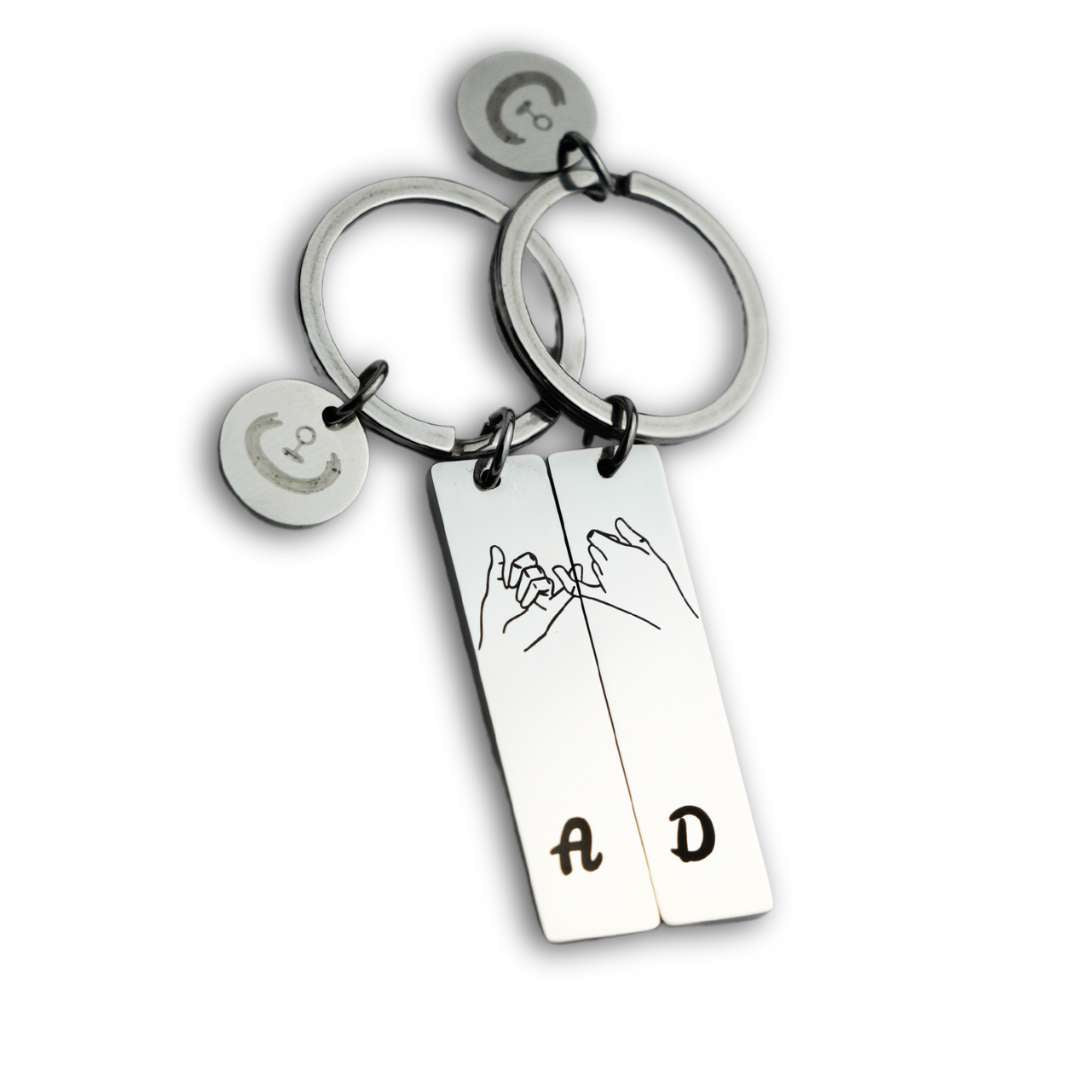 2 Personalisierte Schlüsselanhänger mit passendem Symbol