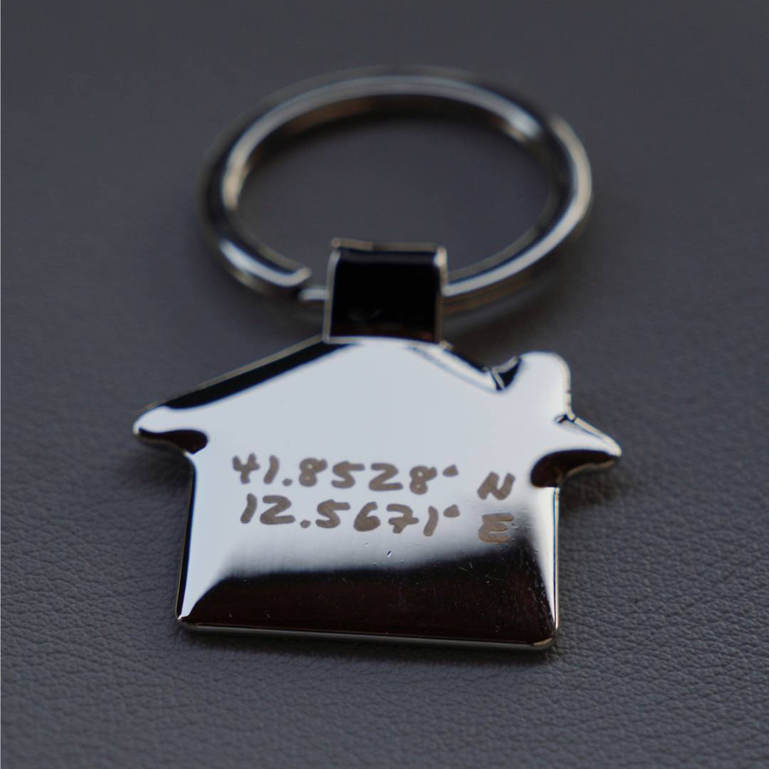 Maßgeschneiderter polierter Haus-Schlüsselanhänger