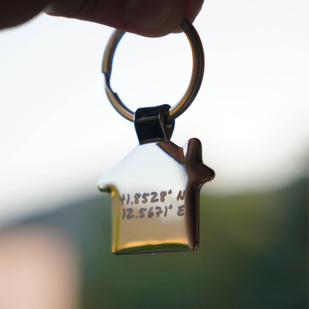 Maßgeschneiderter polierter Haus-Schlüsselanhänger